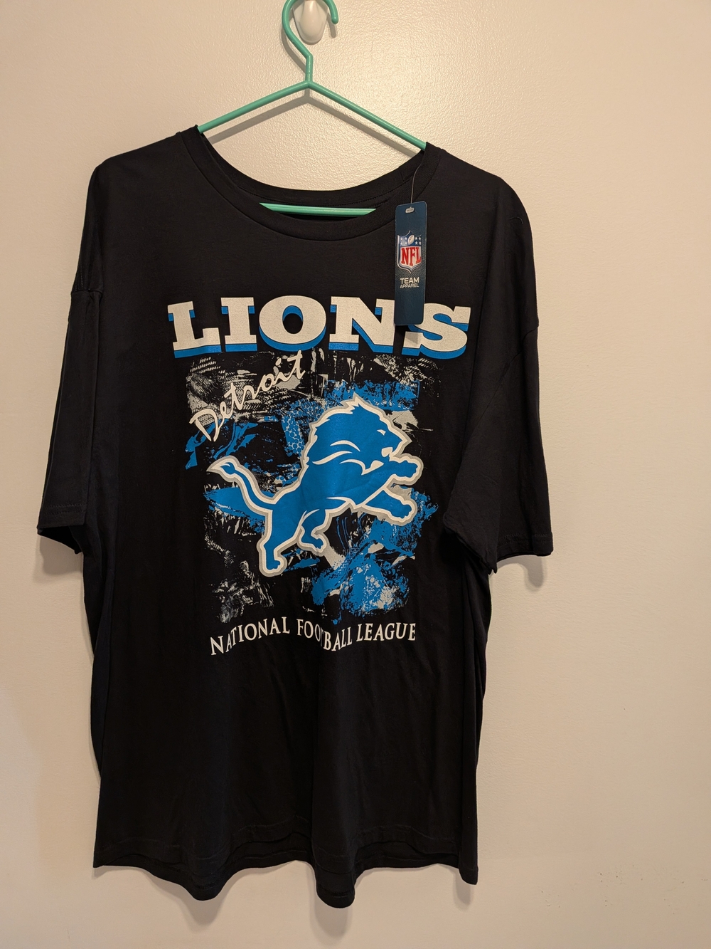 NFL Black Tee with White and Blue Team Graphic